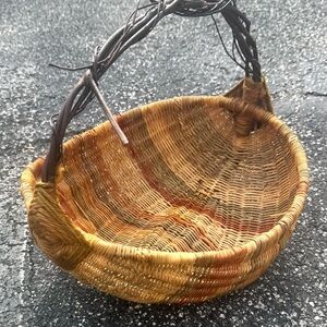 Vintage gathering multi colored butt basket with Grape vine handle